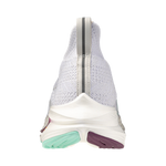 Back view of a sneaker with a white sole and colorful accents on a white background