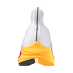 White and yellow raincoat with a black sole on a white background