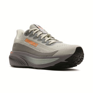 Gray athletic shoe with orange accents on a white background