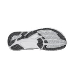 White athletic shoe with black sole on a white background